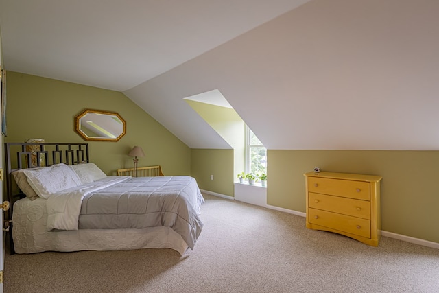 30 Heatherfield Ct, Kilmarnock, VA 22482 - bedroom featuring light colored carpet and vaulted ceiling