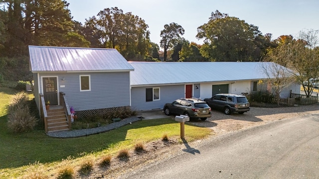 single story home featuring a front yard