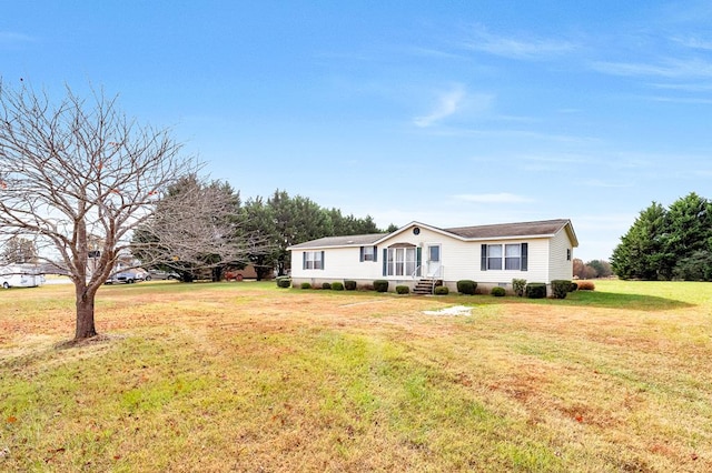 view of front of house with a front lawn