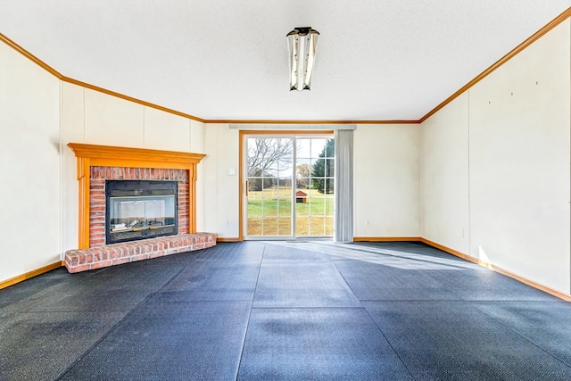 unfurnished living room featuring a textured ceiling, a brick fireplace, and ornamental molding