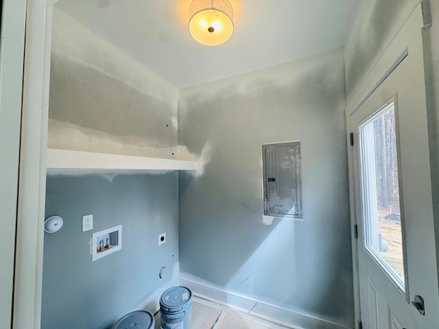 laundry area with hookup for a washing machine, gas dryer hookup, hookup for an electric dryer, laundry area, and electric panel