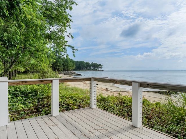 deck featuring a water view