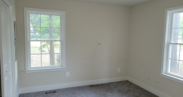 30 Parrish Loop, Montross, VA 22520 - carpeted empty room featuring baseboards and healthy amount of natural light