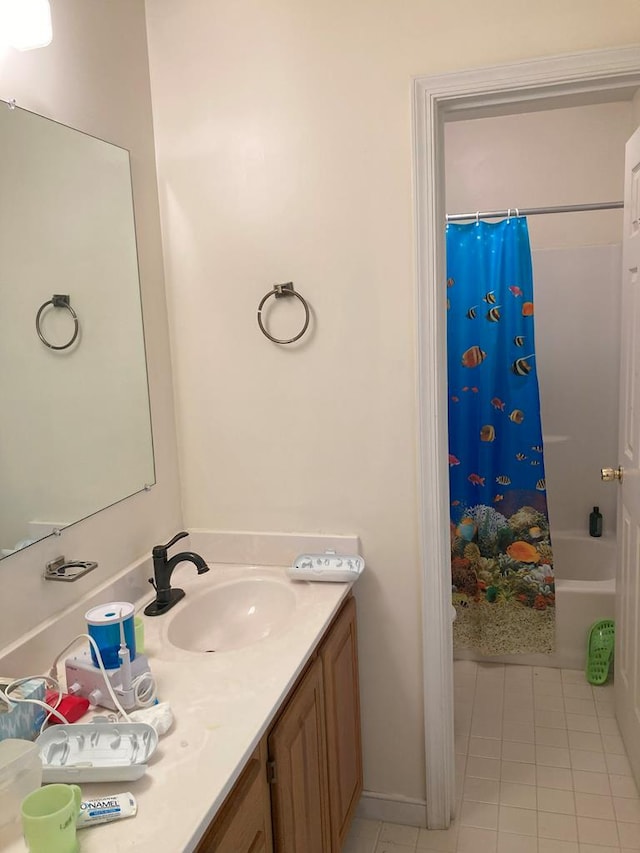 899 N Glebe Rd, Montross, VA 22520 - full bath with tile patterned flooring, vanity, and shower / tub combo