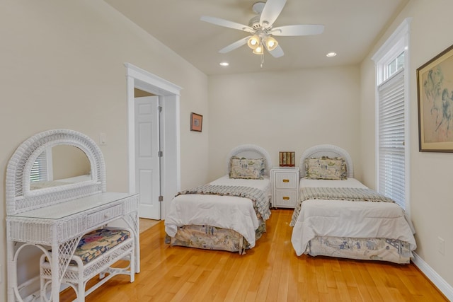 bedroom featuring baseboards, ceiling fan, recessed lighting, and light wood finished floors
