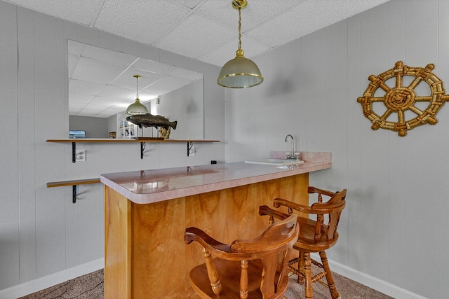 604 High Point Trl, Heathsville, VA 22473 - indoor wet bar with a drop ceiling, hanging light fixtures, carpet floors, and black electric stovetop