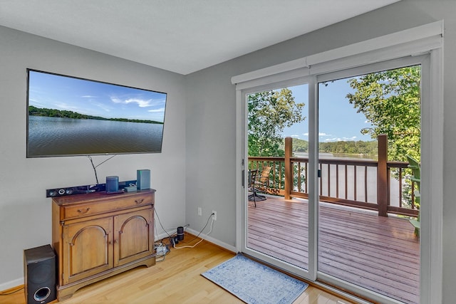 604 High Point Trl, Heathsville, VA 22473 - doorway to outside featuring light wood-style flooring and baseboards