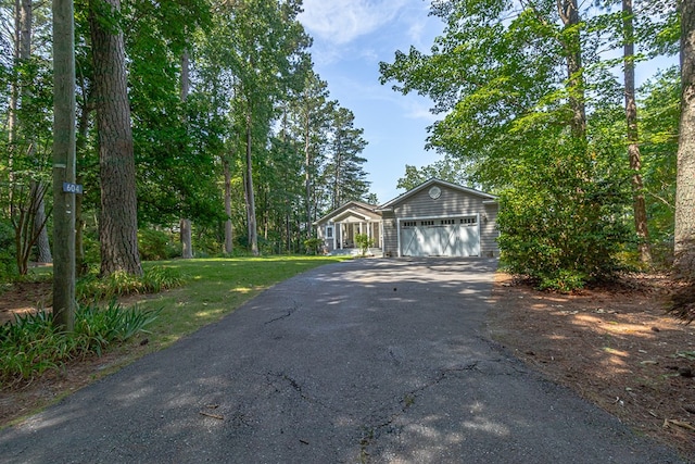 604 High Point Trl, Heathsville, VA 22473 - view of front facade with asphalt driveway and a front lawn