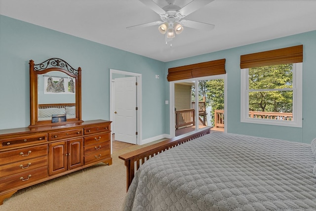 604 High Point Trl, Heathsville, VA 22473 - bedroom with access to exterior, multiple windows, light colored carpet, and ceiling fan