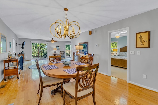 604 High Point Trl, Heathsville, VA 22473 - dining space featuring light wood-style flooring, ceiling fan, and a chandelier