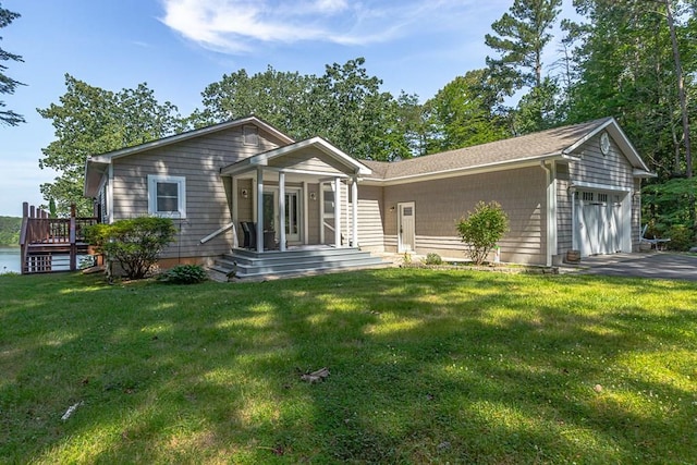 604 High Point Trl, Heathsville, VA 22473 - view of front of property featuring an attached garage, a front yard, and asphalt driveway