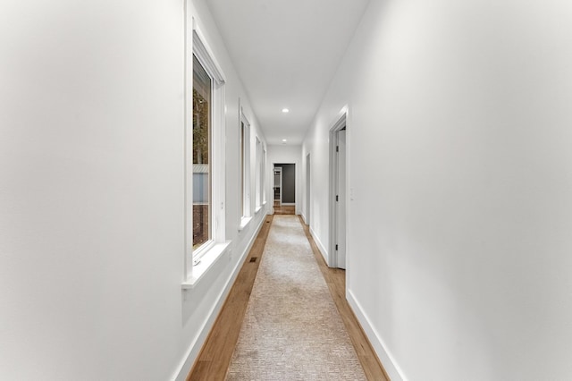 hallway featuring light hardwood / wood-style floors