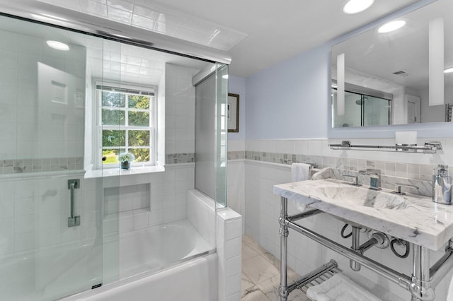 bathroom featuring tile walls