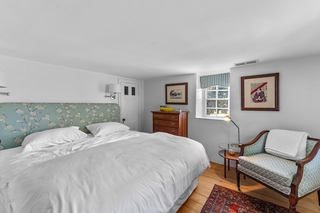 bedroom featuring light hardwood / wood-style flooring