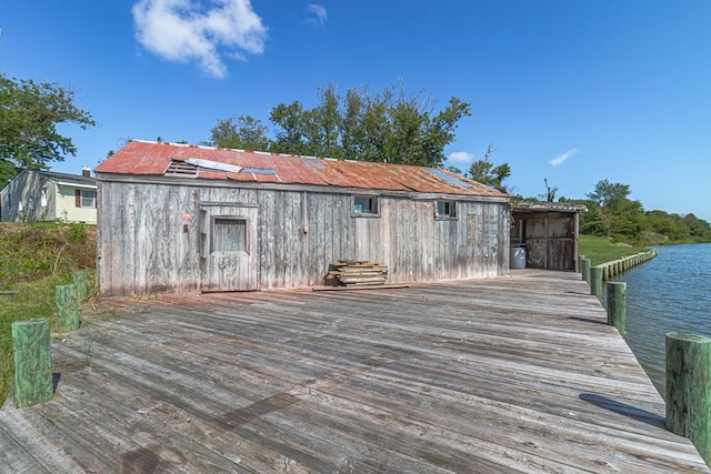 exterior space with a water view