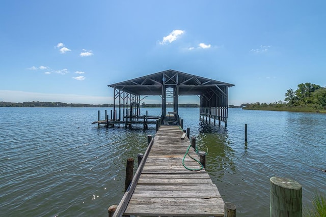 dock area featuring a water view