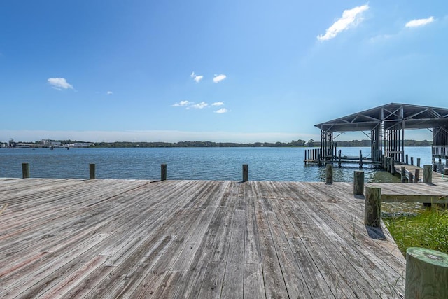 view of dock with a water view