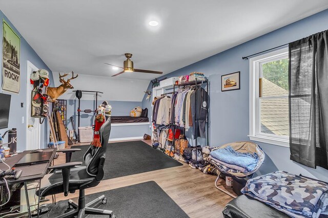 889 Taylors Creek Rd, Weems, VA 22576 - exercise area with a ceiling fan and wood finished floors