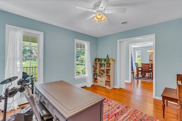 889 Taylors Creek Rd, Weems, VA 22576 - office with light wood finished floors, healthy amount of natural light, and a ceiling fan