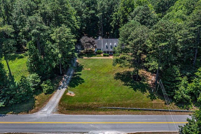 889 Taylors Creek Rd, Weems, VA 22576 - aerial view of property and surrounding area featuring a heavily wooded area
