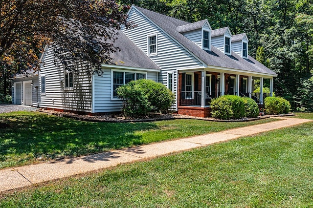 889 Taylors Creek Rd, Weems, VA 22576 - cape cod house with a front lawn, a shingled roof, and an attached garage