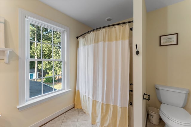 480 Rockingham Rd, Dunnsville, VA 22454 - full bathroom featuring tile patterned floors, plenty of natural light, baseboards, and toilet