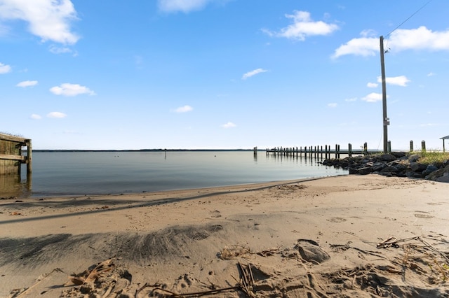 480 Rockingham Rd, Dunnsville, VA 22454 - dock area featuring a water view and a view of the beach