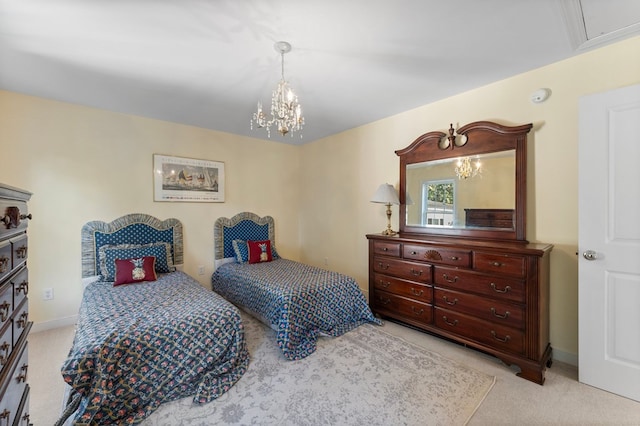 480 Rockingham Rd, Dunnsville, VA 22454 - bedroom featuring light carpet, baseboards, and an inviting chandelier