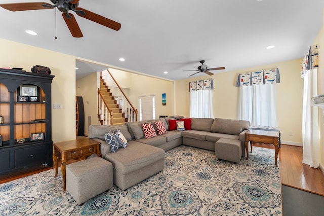 480 Rockingham Rd, Dunnsville, VA 22454 - living area featuring baseboards, ceiling fan, recessed lighting, stairway, and wood finished floors