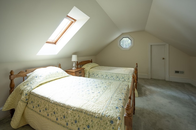 carpeted bedroom with vaulted ceiling