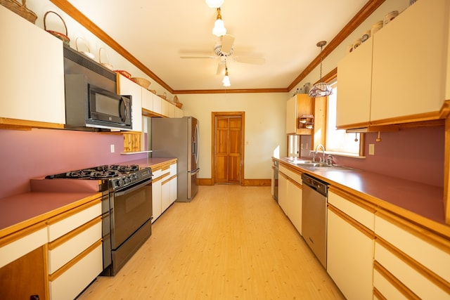 kitchen with white cabinetry, ceiling fan, sink, pendant lighting, and black appliances