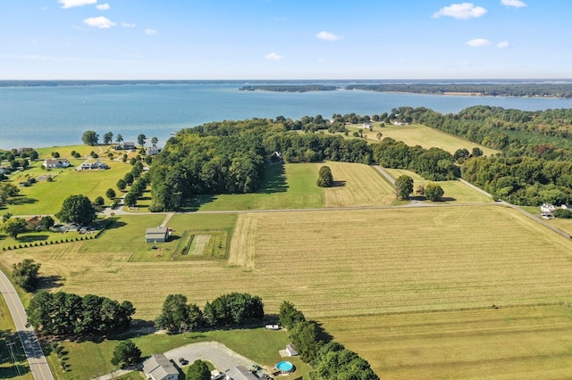 birds eye view of property with a water view and a rural view