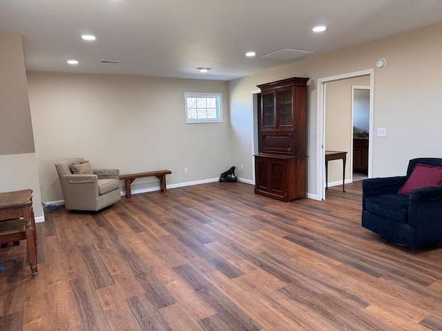 living area featuring dark hardwood / wood-style flooring