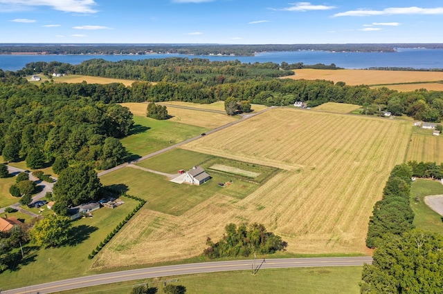 drone / aerial view with a water view and a rural view