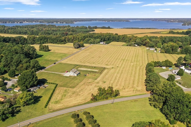 drone / aerial view with a rural view and a water view