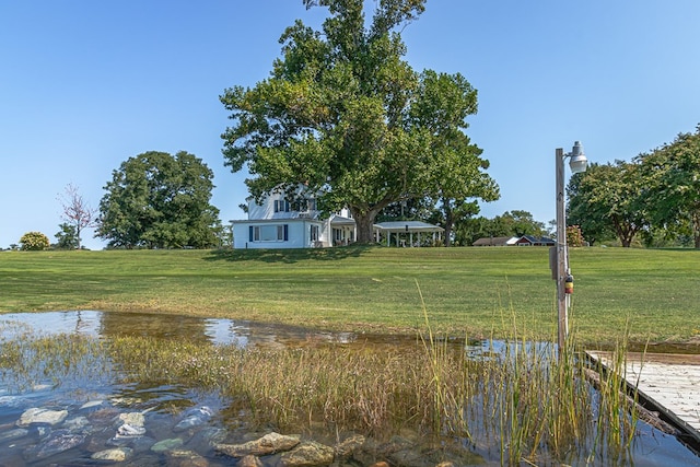 exterior space featuring a water view