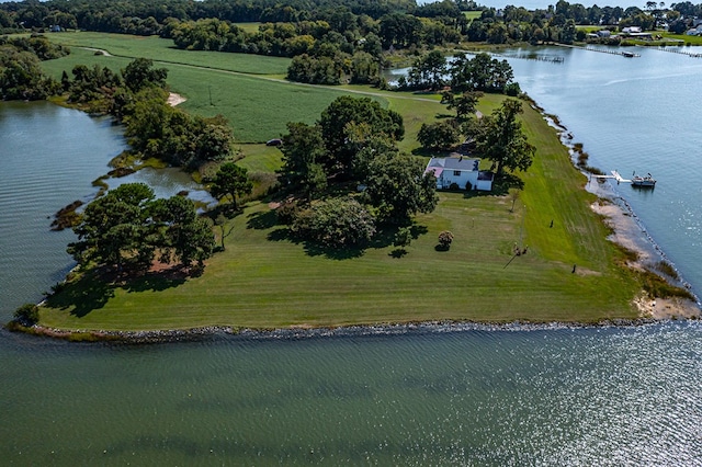 birds eye view of property with a water view and a rural view