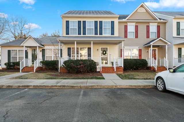 multi unit property featuring covered porch