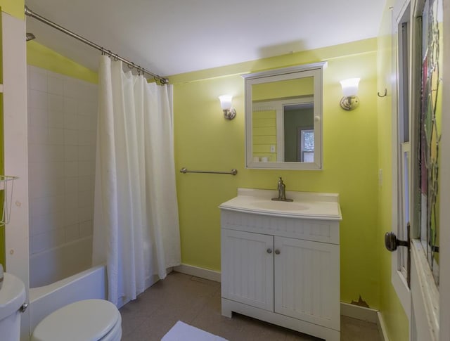 full bathroom with tile patterned flooring, shower / bath combo, vanity, and toilet