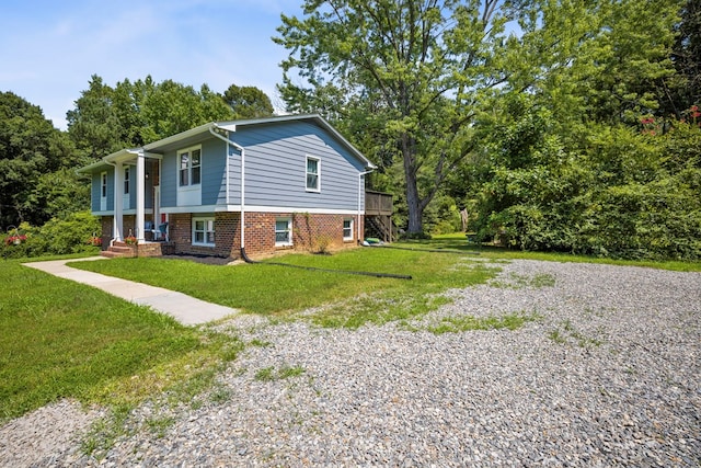 view of property exterior featuring a lawn