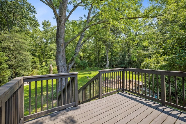 wooden deck with a yard