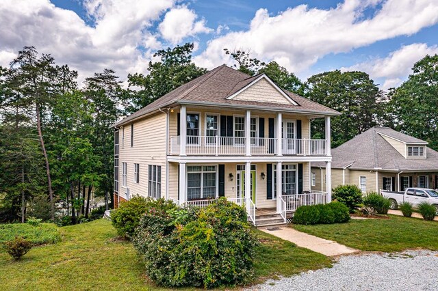 170 Rappa Run Rd, Topping, VA 23169 - view of front of home featuring covered porch, a balcony, and a front yard