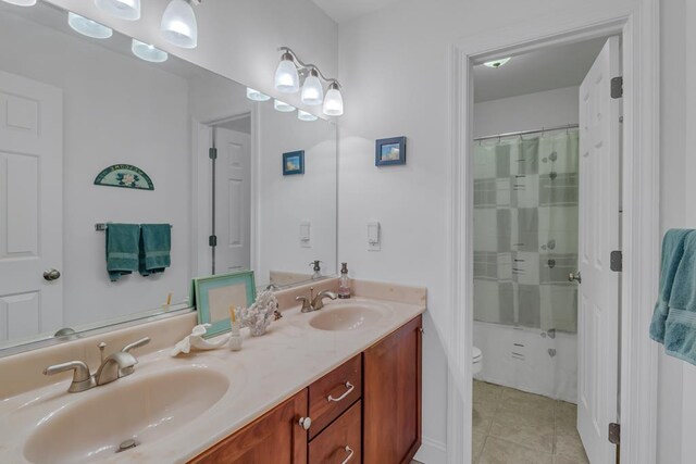 170 Rappa Run Rd, Topping, VA 23169 - bathroom with double vanity, tile patterned flooring, a shower with curtain, and toilet