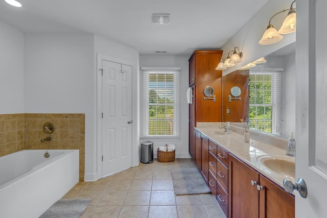170 Rappa Run Rd, Topping, VA 23169 - bathroom featuring double vanity, a bath, baseboards, and tile patterned flooring