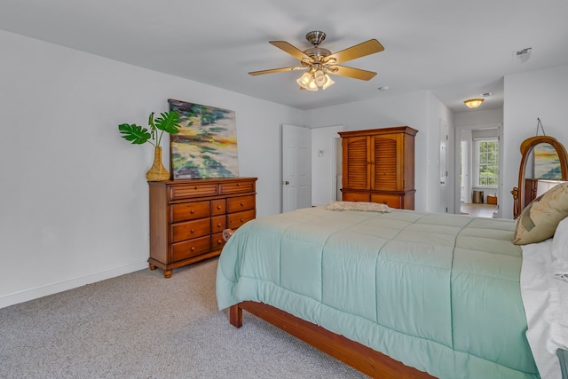 170 Rappa Run Rd, Topping, VA 23169 - bedroom with light carpet, baseboards, and a ceiling fan