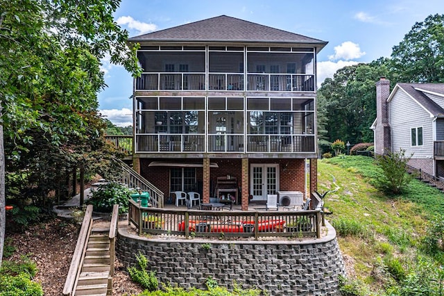 170 Rappa Run Rd, Topping, VA 23169 - rear view of house with stairs, a sunroom, a patio area, french doors, and brick siding