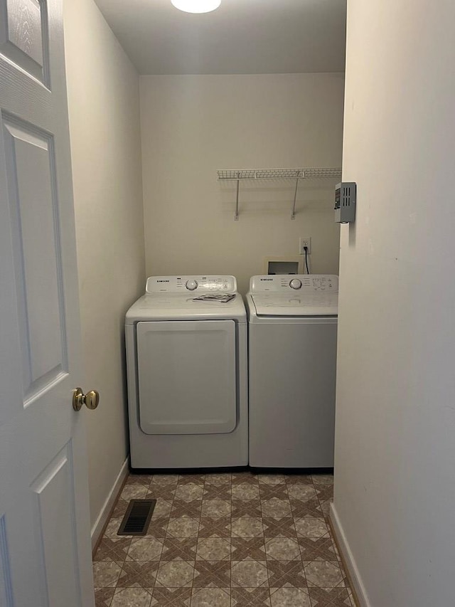55 Deer Run Dr, Heathsville, VA 22473 - laundry area with independent washer and dryer and baseboards