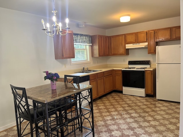 55 Deer Run Dr, Heathsville, VA 22473 - kitchen featuring white appliances, under cabinet range hood, light flooring, light countertops, and a chandelier