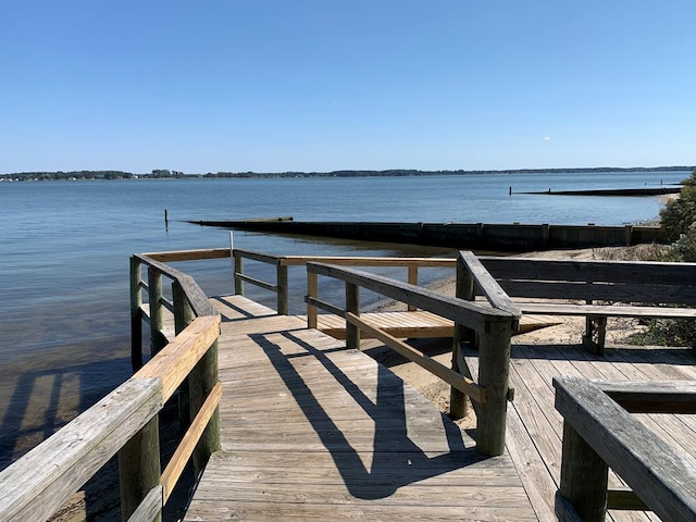 dock area featuring a water view