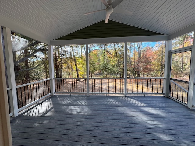 wooden terrace featuring ceiling fan